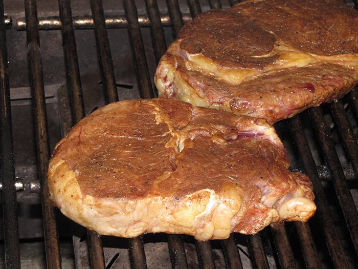 Steak sizzling on the grill with Dechant Spice!